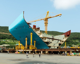 Illustration for article titled Pictures of the World's Biggest Cargo Ship Make You Feel Tiny